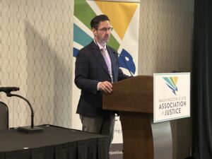 An image of Attorney Paul Veillon speaking at WSAJ