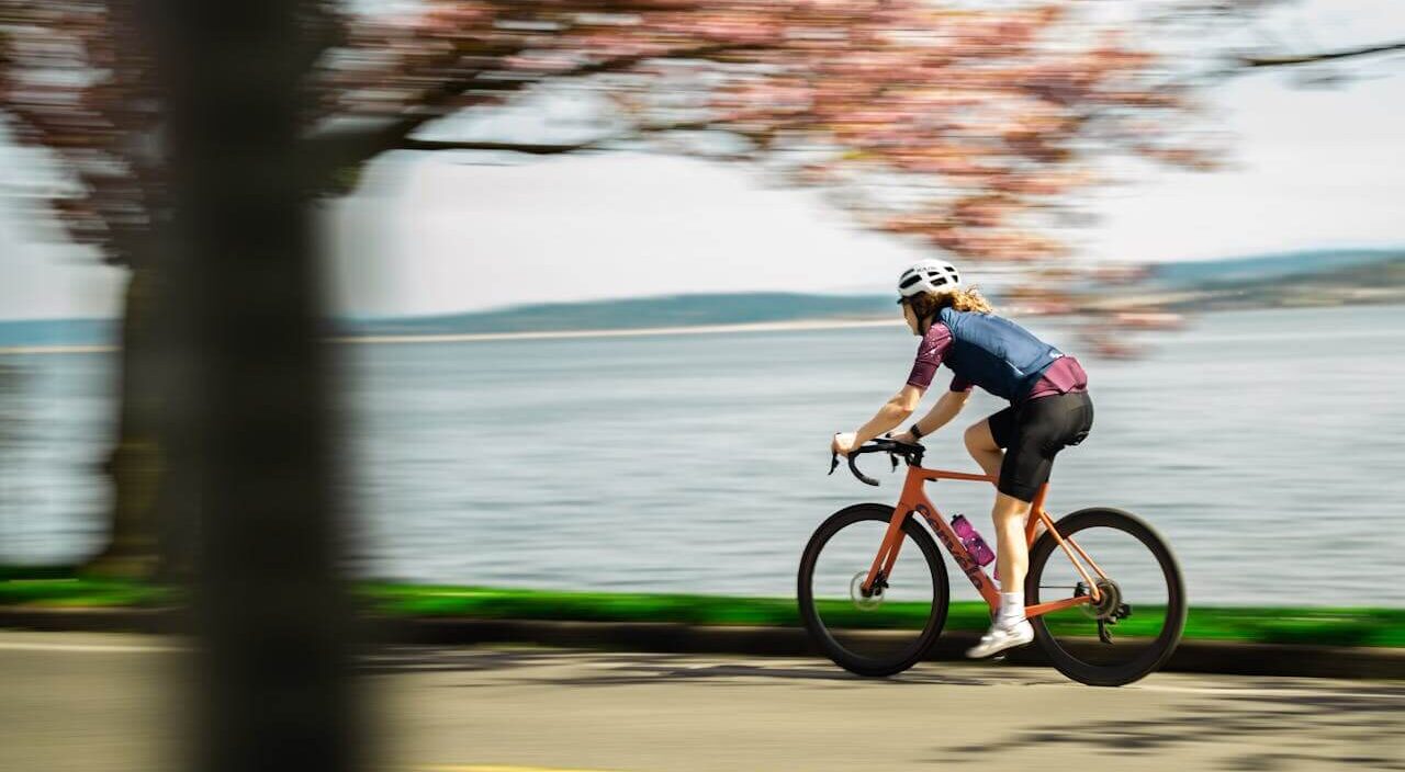 Bicyclist by the water in seattle washington